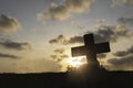 Silhouette Jesus christÃÂ deathÃÂ on cross crucifixion on calvary hill in sunset good friday risen in easter day concept for Royalty Free Stock Photo